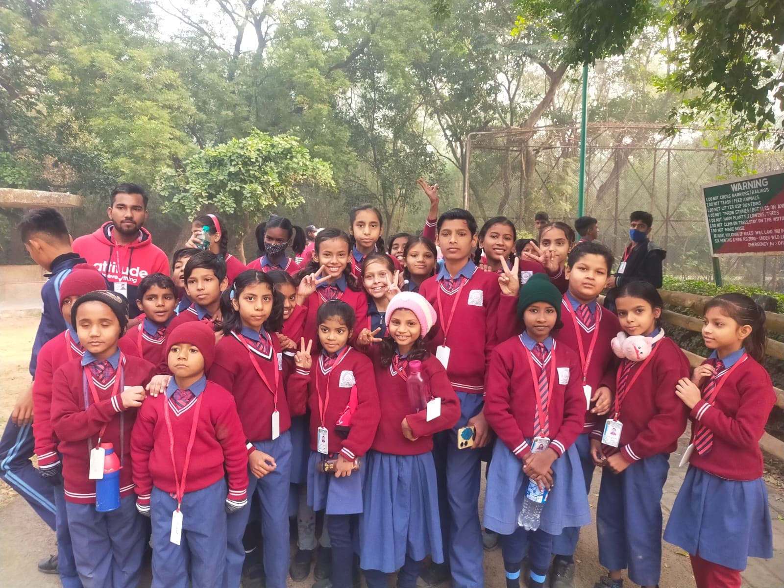 Students and teachers on an educational trip to the Red Fort