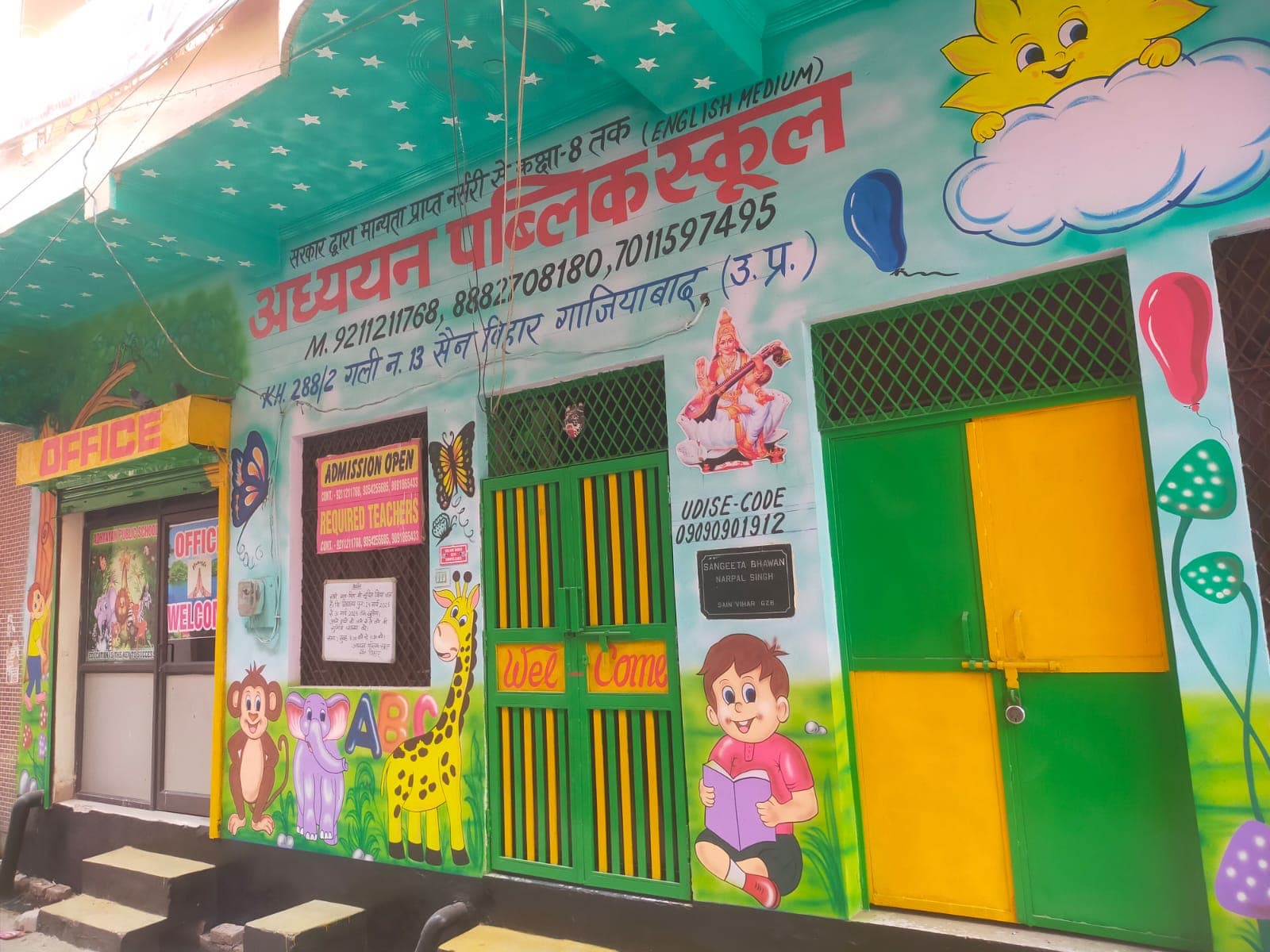 Adhyayan Public School's colorfully painted campus entrance and signage